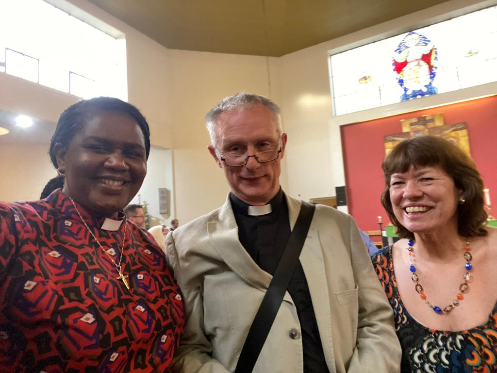 Alan Gregory with Rev Eucharia Asiegbu (left) and Debbie Annells (right) attending a worship event.