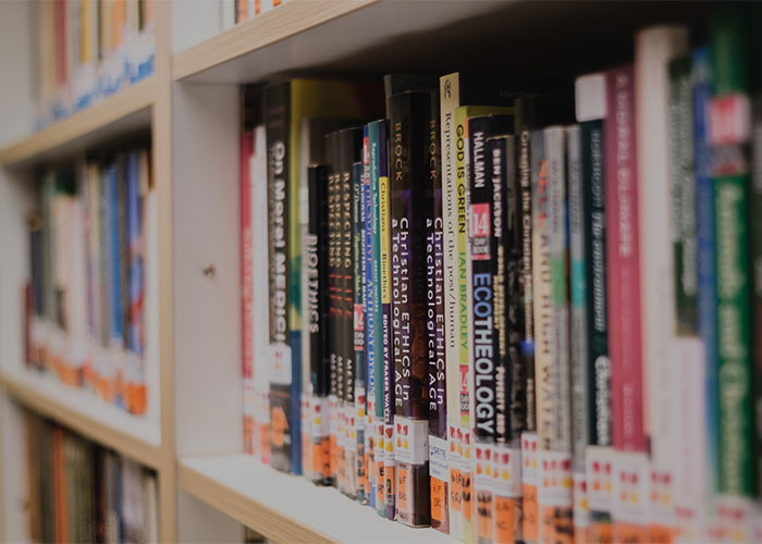 Theology books on the shelves St Augustine's Trinity House library