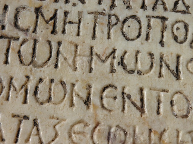 Greek writing on stone Engraved Greek letters on stone.