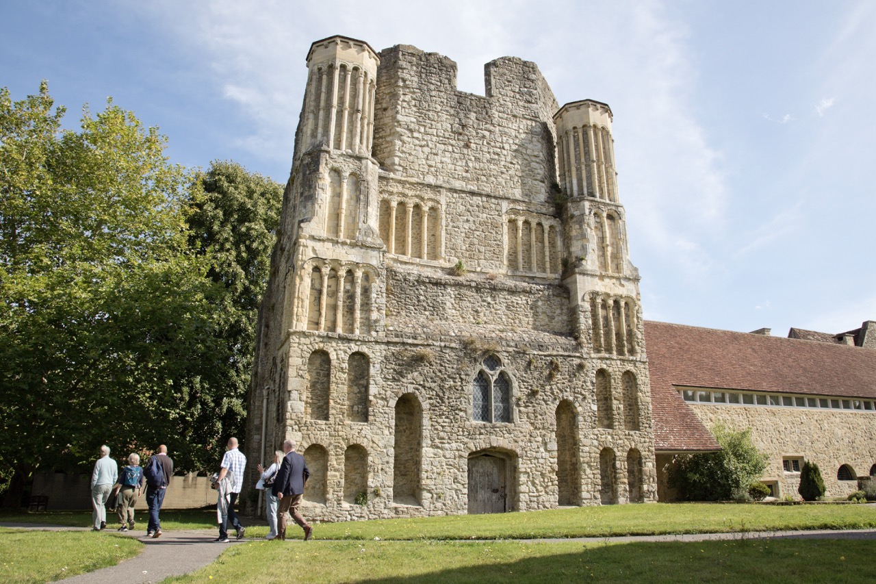 The grounds of West Malling campus, St Augustine's College of Theology. A large old building surrounded by grass.